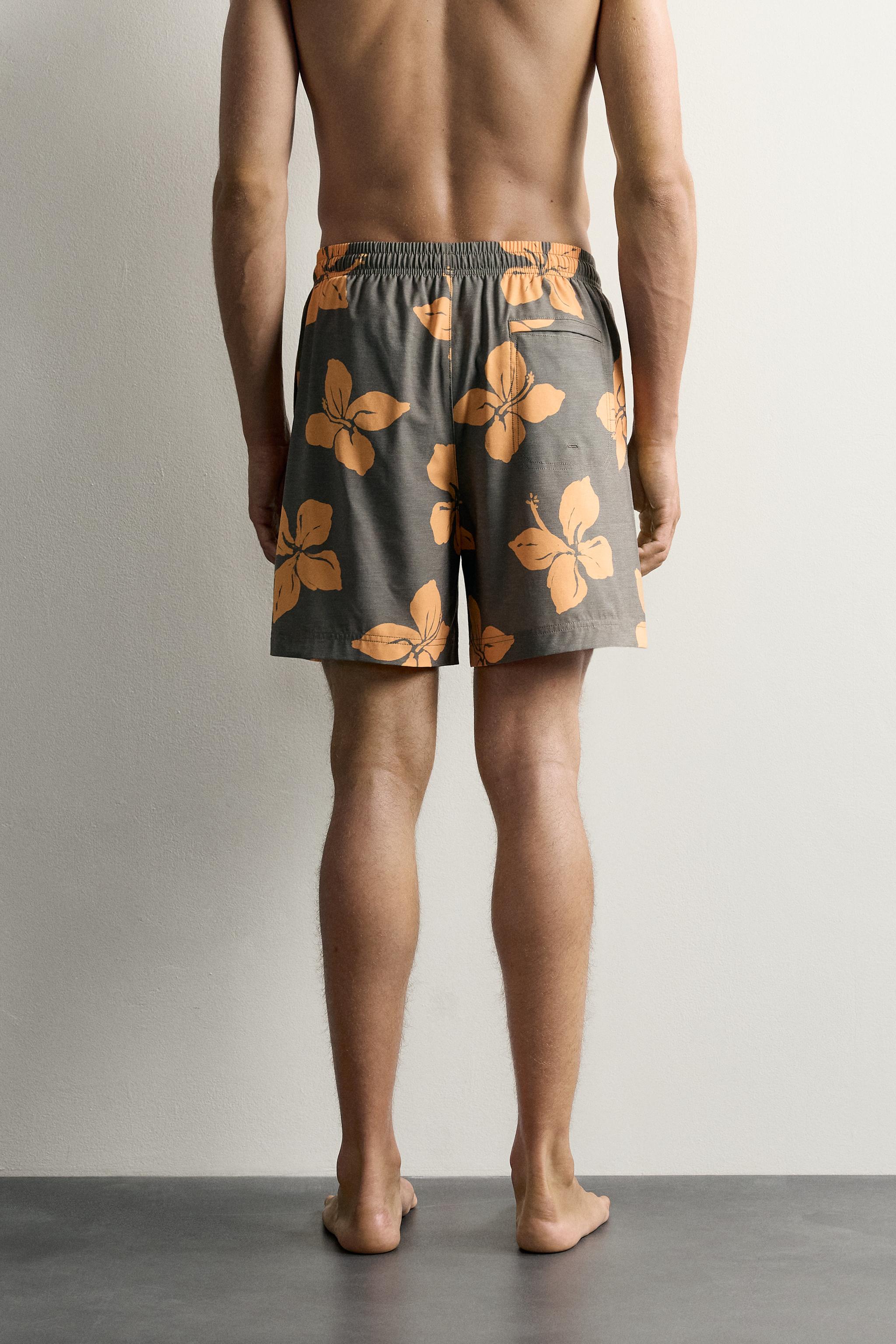 LONG FLORAL PRINT SWIM SHORTS